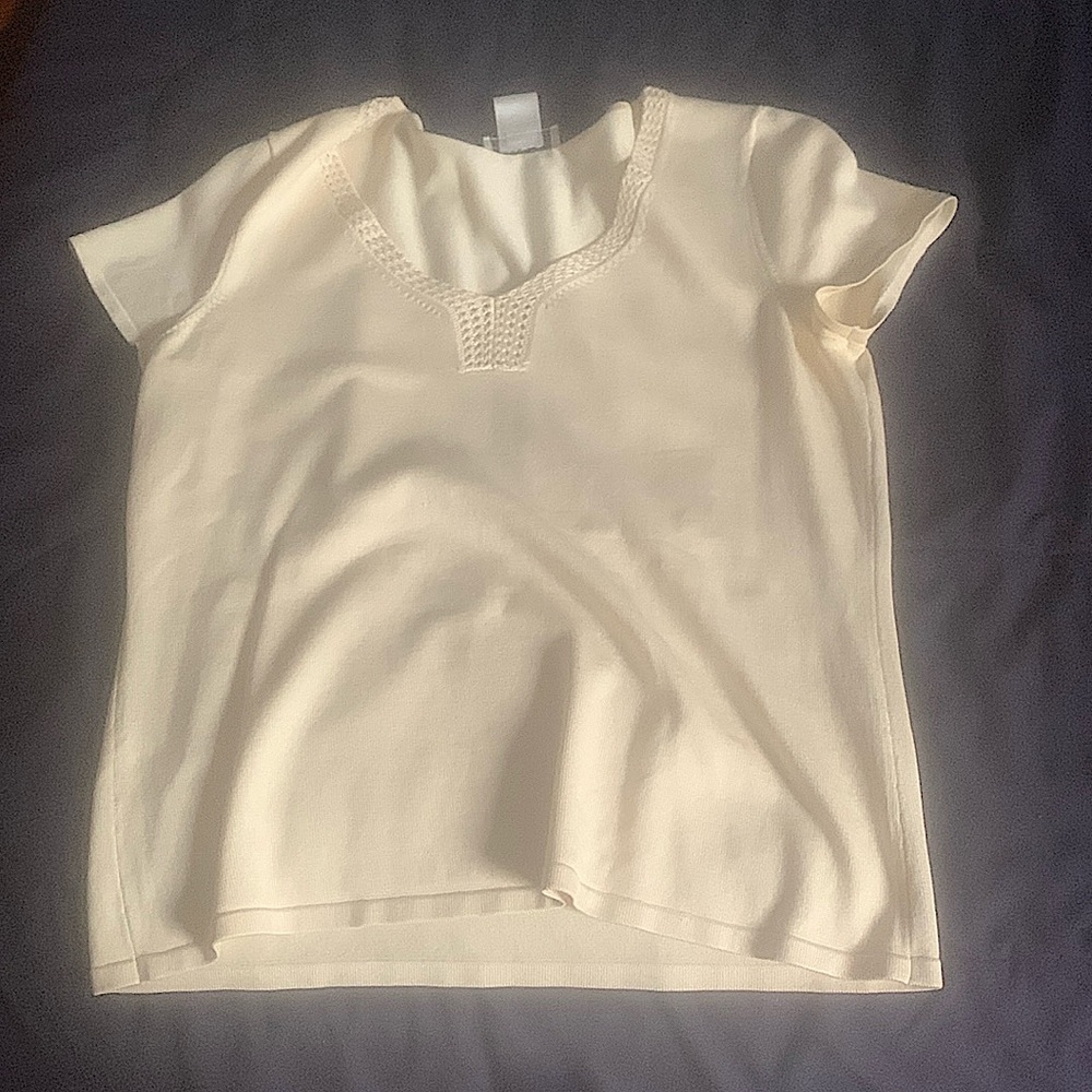 Cream colored short sleeve shirt